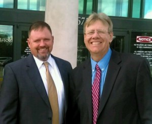 Muise and Zastrow outside of the 18th Judicial District Court