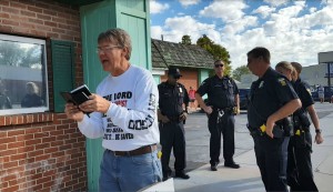 Cal Preaching with Police Watching--2