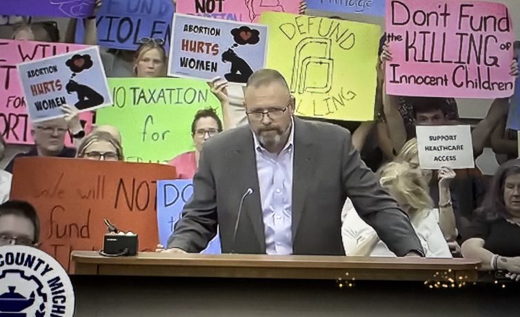 Speaking at County Board Meeting